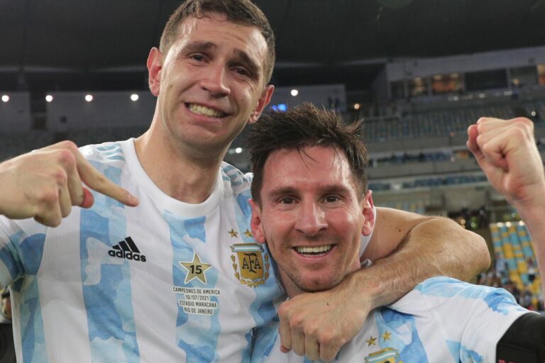 Emiliano Martinez and Lionel Messi